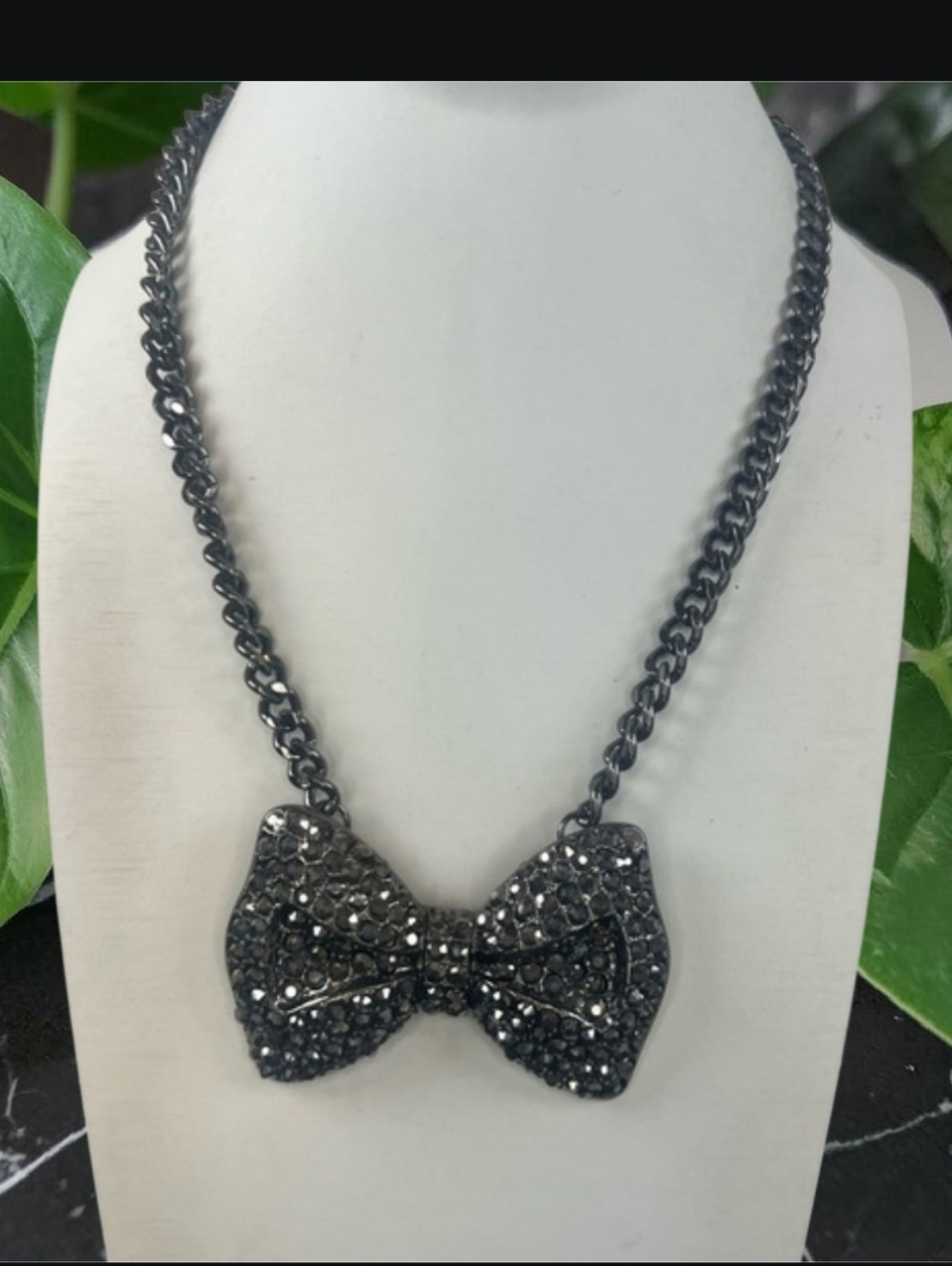 Elegant Gunmetal Crystal Bow Pendant Necklace